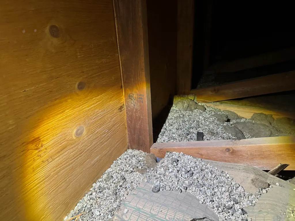Vermiculite Insulation which MAY contain asbestos
